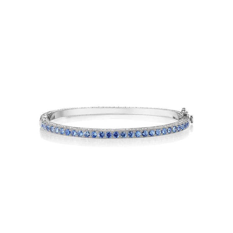 18KWG 28=1.95CT BLUE SAPPHIRE ENGRAVED BANGLE