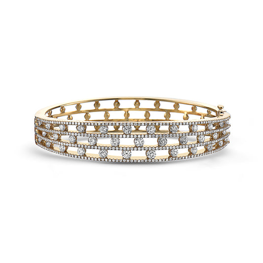 18KYG 335=3.48CT FGSI TRIPLE ROW BRACELET